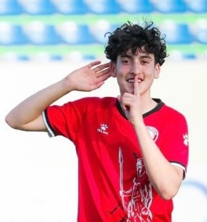Tariq celebrating